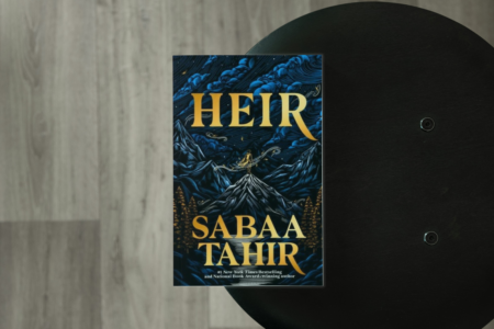 photo of book heir by Sabaa Tahir on a stool