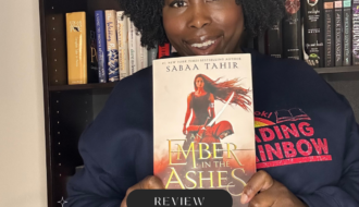 picture of me holding book an ember in the ashes by sabaa tahir